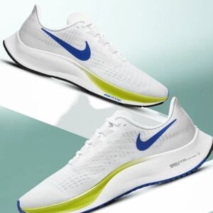 Nike Men’s White Running Shoes with Blue Swoosh and Lime Accent